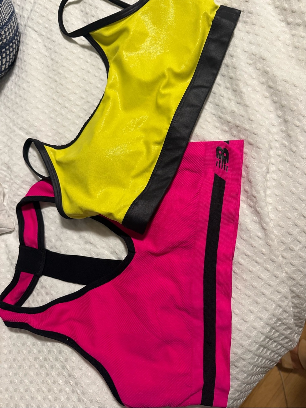 Zyia yellow and black & New Balance pink and black sports bras (L)